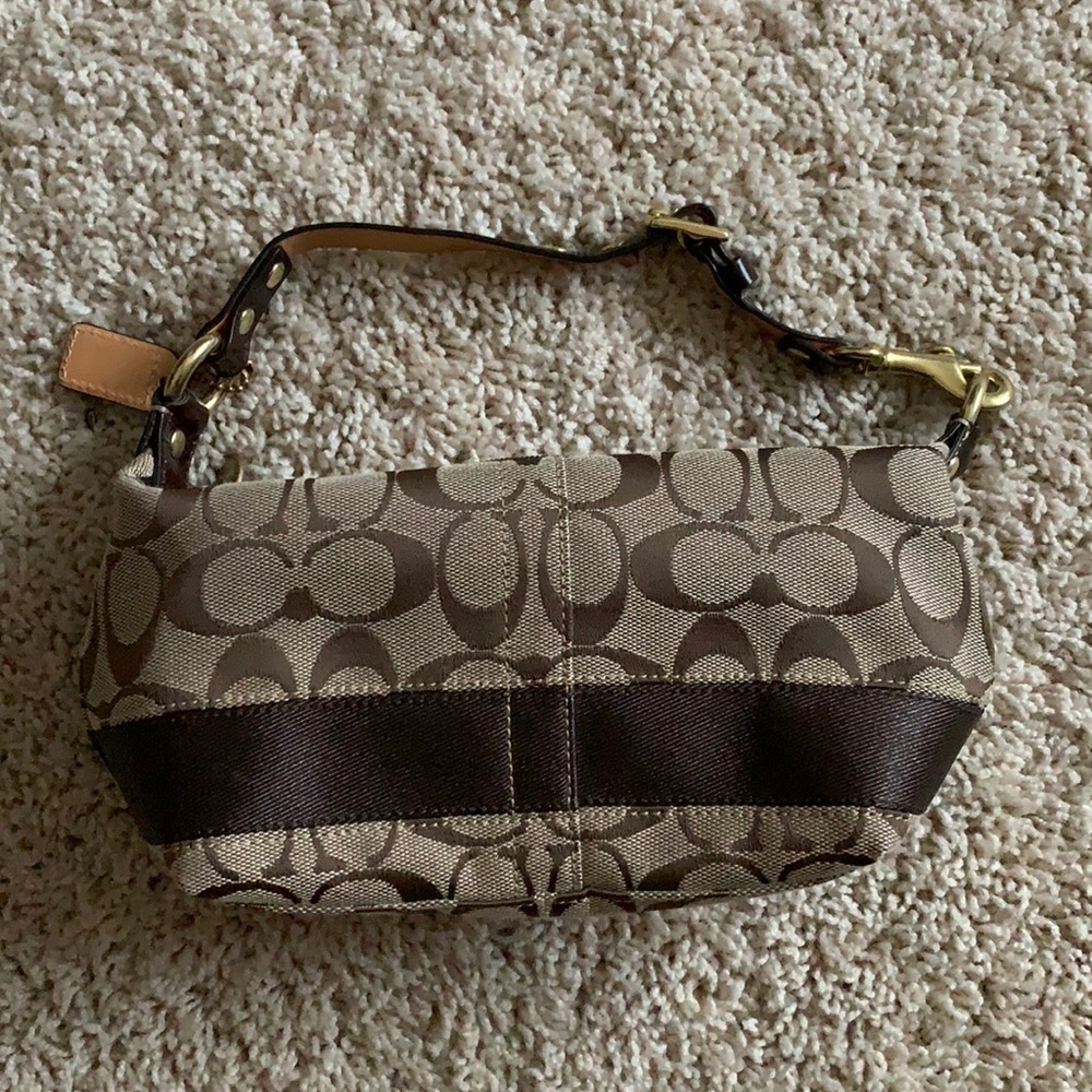 Never been used, well kept, Coach mini bag.